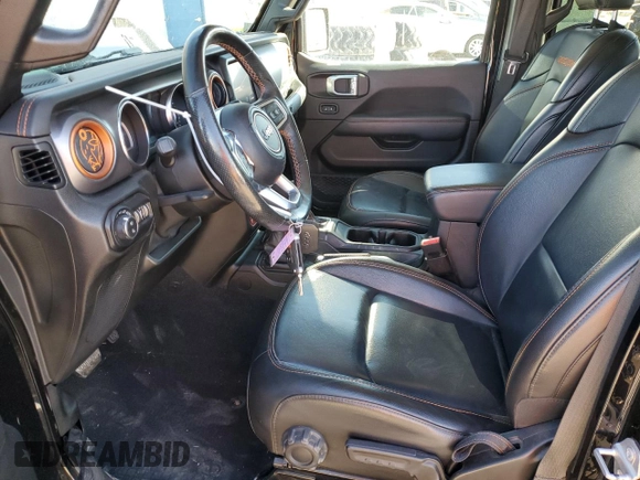 2020 Jeep Gladiator Mojave z VIN 1C6JJTEG1LL209606, wystawiony jako Copart lot #88265265 z przebiegiem 57 098 mil mil oraz Szkoda całkowita • Salvage title. Historia ofert i sprzedaży dostępna na DreamBid. Obrazek 7.