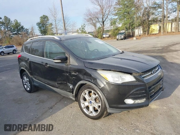 2015 Ford Escape Titanium with VIN 1FMCU0J98FUA19911, listed as a IAAI auction lot 41750596 with 106,706 mi miles. Bid and sale history available at carsss.com. Image 1.