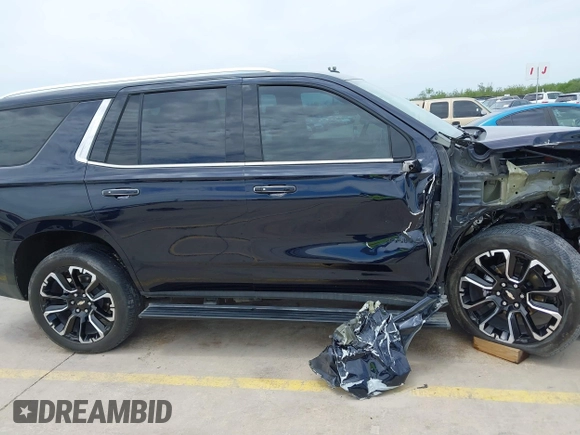 2023 Chevrolet Tahoe High Country with VIN 1GNSCTKT8PR215292, listed as a IAAI auction lot 42377531 with 32,525 mi miles and . Bid and sale history available at DreamBid. Image 13.