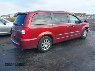 2013 Chrysler Town & Country Touring with VIN 2C4RC1BG0DR634631, listed as a IAAI auction lot 40686174 with 143,206 mi miles. Bid and sale history available at carsss.com. Image 4.