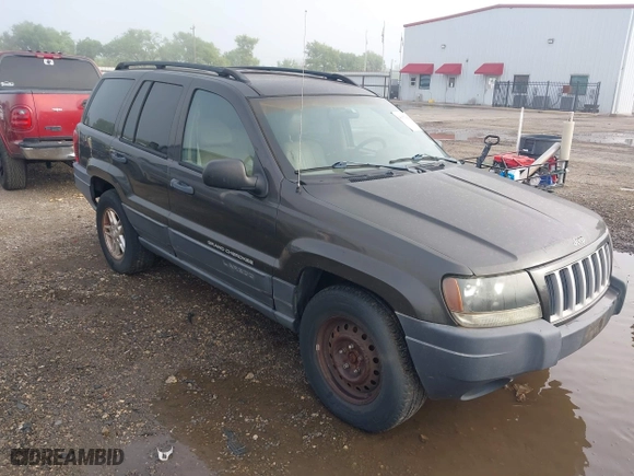 2004 Jeep Grand Cherokee Laredo with VIN 1J4GX48N74C385749, listed as a IAAI auction lot 41877421 with 141,255 mi miles. Bid and sale history available at carsss.com. Image 1.