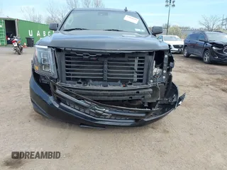 2017 Chevrolet Suburban LT with VIN 1GNSKHKCXHR194365, listed as a IAAI auction lot 42060690 with 213,424 mi miles and . Bid and sale history available at DreamBid. Image 17.