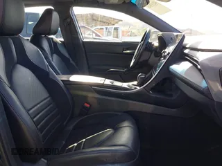 2021 Toyota Avalon Hybrid XSE z VIN 4T1EA1AB3MU005275, wystawiony jako IAAI lot #42335546 z przebiegiem 46 524 mil mil oraz . Historia ofert i sprzedaży dostępna na DreamBid. Obrazek 5.
