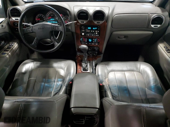 2004 GMC Envoy SLT with VIN 1GKDT13S842421586, listed as a Copart auction lot 51936515 with 188,977 mi miles and Salvage title. Bid and sale history available at DreamBid. Image 8.