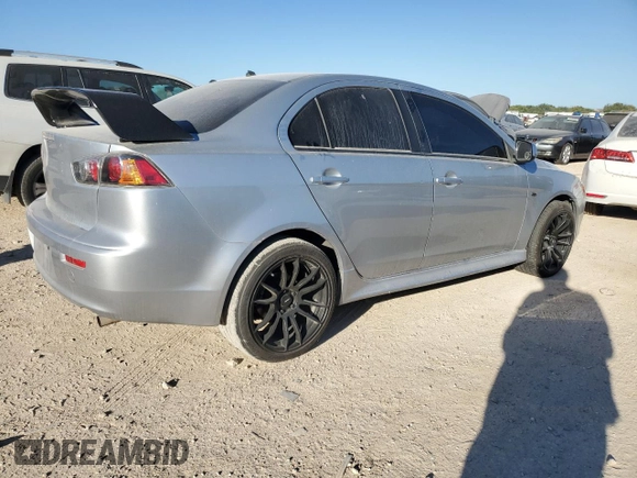 2014 Mitsubishi Lancer ES with VIN JA32U2FU8EU013693, listed as a Copart auction lot 77821024 with 130,306 mi miles and Salvage Title. Bid and sale history available at DreamBid. Image 3.