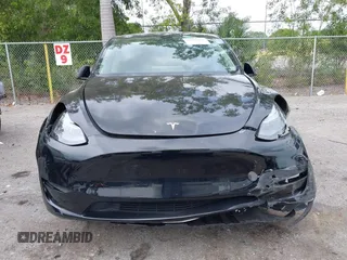 2023 Tesla Model Y Long Range with VIN 7SAYGAEE8PF928923, listed as a IAAI auction lot 41880988 with 18,468 mi miles. Bid and sale history available at carsss.com. Image 12.