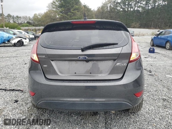 2018 Ford Fiesta SE z VIN 3FADP4EJ5JM103411, wystawiony jako Copart lot #50130325 z przebiegiem 111 247 mil mil oraz Szkoda całkowita • Salvage title. Historia ofert i sprzedaży dostępna na DreamBid. Obrazek 6.