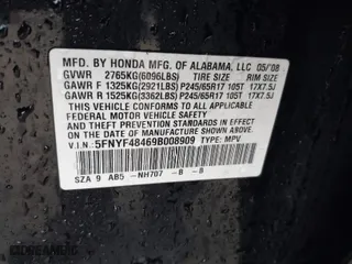 2009 Honda Pilot EX with VIN 5FNYF48469B008909, listed as a IAAI auction lot 41936818 with 261,834 mi miles. Bid and sale history available at carsss.com. Image 9.