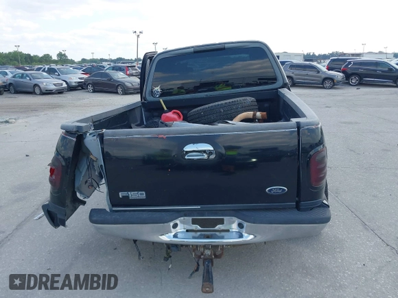 2003 Ford F-150 XLT z VIN 1FTRW08L73KA58913, wystawiony jako IAAI lot #41907277 z przebiegiem 147 294 mil mil oraz . Historia ofert i sprzedaży dostępna na DreamBid. Obrazek 16.
