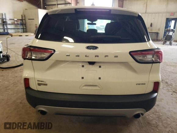 2021 Ford Escape SEL z VIN 1FMCU9H61MUA87268, wystawiony jako Copart lot #60645795 z przebiegiem 47 219 mil mil oraz Szkoda całkowita • Salvage title. Historia ofert i sprzedaży dostępna na DreamBid. Obrazek 6.