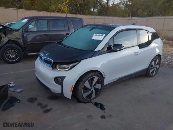 2015 BMW i3 with VIN WBY1Z4C52FV503063, listed as a IAAI auction lot 40644359 with NaN miles. Bid and sale history available at carsss.com. Image 2.