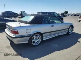 1999 BMW 3 Series 328i with VIN WBABK733XXET68116, listed as a Copart auction lot 66958525 with 116,302 mi miles and Salvage title. Bid and sale history available at DreamBid. Image 3.