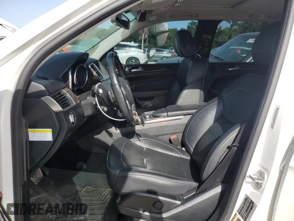 2014 Mercedes-Benz M 350 with VIN 4JGDA5JB0EA283475, listed as a Copart auction lot 57140295 with 105,777 mi miles and Salvage title. Bid and sale history available at DreamBid. Image 7.
