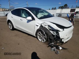 2021 Tesla Model Y Long Range with VIN 5YJYGDEE5MF118045, listed as a Copart auction lot 50790065 with 43,704 mi miles and Salvage Title. Bid and sale history available at DreamBid. Image 4.