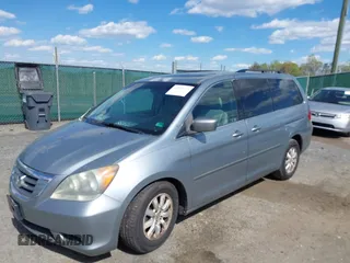 2010 Honda Odyssey EX-L with VIN 5FNRL3H74AB046578, listed as a IAAI auction lot 42049213 with 218,457 mi miles. Bid and sale history available at carsss.com. Image 17.