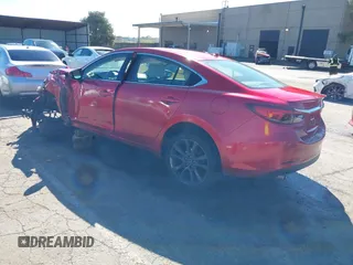 2016 Mazda 6 i Grand Touring с VIN JM1GJ1W50G1430328, выставлен на аукционе IAAI как лот 41879262 с пробегом 122 545 миль миль и . История ставок и продаж доступна на DreamBid. Изображение 3.