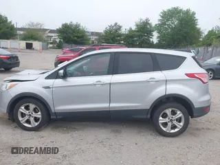 2015 Ford Escape SE z VIN 1FMCU0G73FUB10414, wystawiony jako IAAI lot #42173063 z przebiegiem 120 200 mil mil oraz . Historia ofert i sprzedaży dostępna na DreamBid. Obrazek 15.