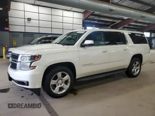 2015 Chevrolet Suburban LT with VIN 1GNSKJKC8FR147792, listed as a Copart auction lot 55622335 with 184,698 mi miles and Clean Title. Bid and sale history available at carsss.com. Image 1.