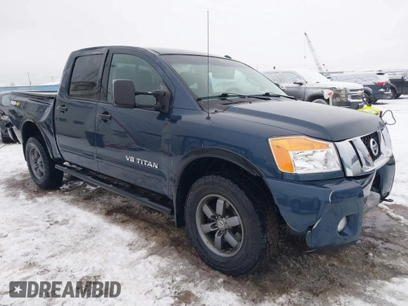 2015 Nissan Titan SV z VIN 1N6AA0ECXFN507260, wystawiony jako IAAI lot #41203612 z przebiegiem 103 000 mil mil oraz . Historia ofert i sprzedaży dostępna na DreamBid. Obrazek 1.