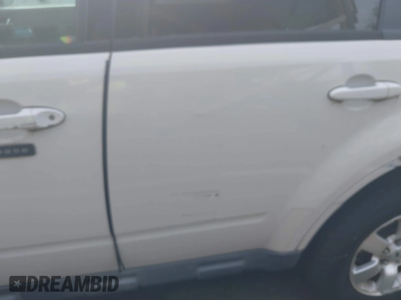 2009 Ford Escape Hybrid with VIN 1FMCU593X9KB70360, listed as a IAAI auction lot 42270239 with 133,658 mi miles and . Bid and sale history available at DreamBid. Image 6.