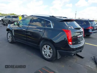 2013 Cadillac SRX Premium Collection with VIN 3GYFNEE34DS535613, listed as a IAAI auction lot 42336365 with 106,426 mi miles and . Bid and sale history available at DreamBid. Image 3.