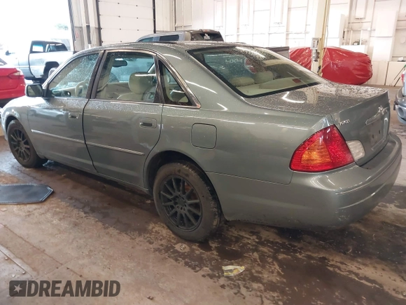 2000 Toyota Avalon XL with VIN 4T1BF28B9YU111753, listed as a IAAI auction lot 41243138 with 113,324 mi miles and . Bid and sale history available at DreamBid. Image 3.