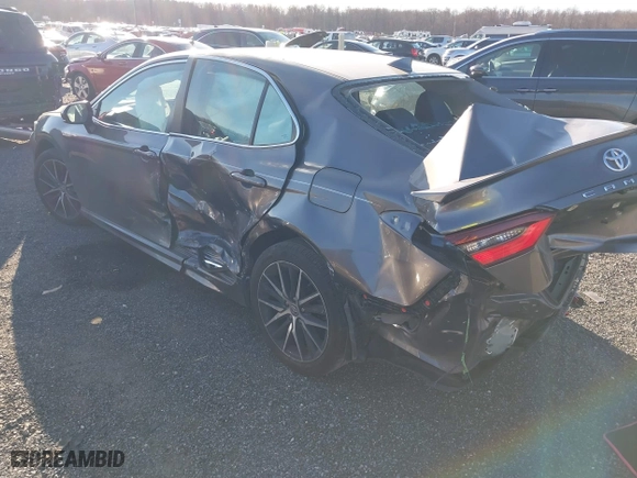2021 Toyota Camry SE Nightshade with VIN 4T1G11AK2MU485544, listed as a IAAI auction lot 41000022 with 57,374 mi miles. Bid and sale history available at carsss.com. Image 3.