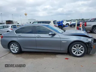 2014 BMW 5 Series 528i with VIN WBA5A5C52ED500696, listed as a IAAI auction lot 41708462 with 121,592 mi miles. Bid and sale history available at carsss.com. Image 13.