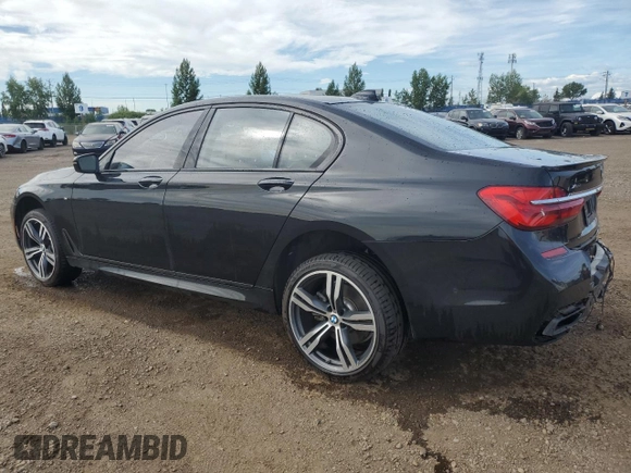2019 BMW 7 Series 750i xDrive with VIN WBA7B0C53KG527537, listed as a Copart auction lot 64113345 with 36,820 mi miles and Salvage title. Bid and sale history available at DreamBid. Image 2.