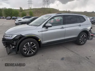 2023 Volkswagen Tiguan S with VIN 3VVFB7AXXPM103928, listed as a Copart auction lot 57119895 with 13,820 mi miles and Salvage title. Bid and sale history available at DreamBid. Image 1.