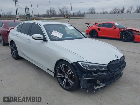2021 BMW 3 Series 330i z VIN 3MW5R1J08M8B58921, wystawiony jako IAAI lot #41495865 z przebiegiem 82 971 mil mil oraz . Historia ofert i sprzedaży dostępna na DreamBid. Obrazek 1.