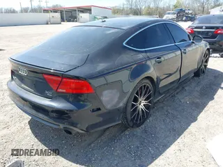 2013 Audi A7 Prestige with VIN WAU2GAFC0DN054304, listed as a IAAI auction lot 41717873 with 168,651 mi miles and . Bid and sale history available at DreamBid. Image 4.