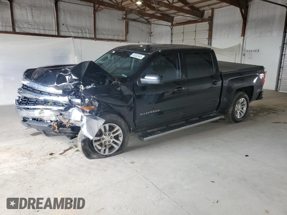 2018 Chevrolet Silverado 1500 LT with VIN 3GCUKREC2JG345482, listed as a Copart auction lot 52452445 with 100,824 mi miles and Salvage Title. Bid and sale history available at DreamBid. Image 1.