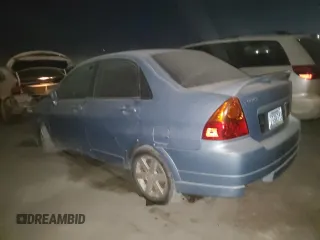2005 Suzuki Aerio S z VIN JS2RA61SX55250286, wystawiony jako Copart lot #73859164 z przebiegiem 120 033 mil mil oraz Nie do naprawy. Historia ofert i sprzedaży dostępna na DreamBid. Obrazek 2.