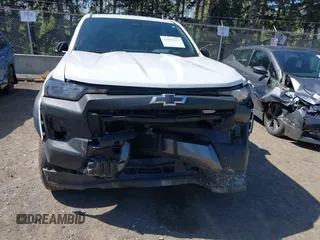 2023 Chevrolet Colorado 4WD Trail Boss with VIN 1GCPTEEK2P1203392, listed as a IAAI auction lot 42043211 with 27,589 mi miles. Bid and sale history available at carsss.com. Image 6.