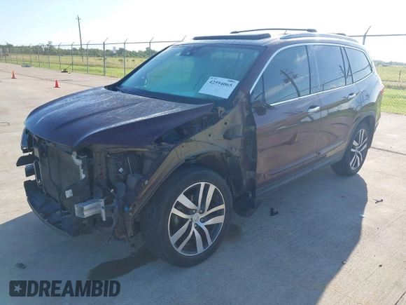 2017 Honda Pilot Touring with VIN 5FNYF5H96HB038413, listed as a IAAI auction lot 42594065 with 130,501 mi miles and . Bid and sale history available at DreamBid. Image 17.