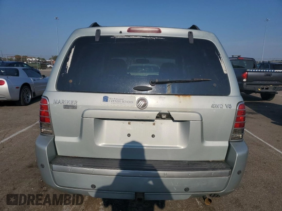 2005 Mercury Mariner Luxury z VIN 4M2CU57125DJ16694, wystawiony jako Copart lot #69063704 z przebiegiem 222 793 mil mil oraz Szkoda całkowita • Salvage title. Historia ofert i sprzedaży dostępna na DreamBid. Obrazek 6.