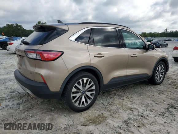 2020 Ford Escape Titanium Hybrid with VIN 1FMCU0DZ0LUC18460, listed as a Copart auction lot 57671085 with 97,587 mi miles and Salvage title. Bid and sale history available at DreamBid. Image 3.