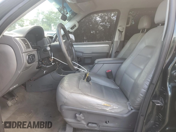 2004 Ford Explorer XLT with VIN 1FMZU73K14UA95471, listed as a Copart auction lot 63702145 with 100,210 mi miles and Salvage title. Bid and sale history available at DreamBid. Image 7.