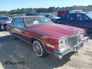 1984 Cadillac Eldorado z VIN 1G6AL5789EE608519, wystawiony jako IAAI lot #41577924 z przebiegiem 12 416 mil mil oraz . Historia ofert i sprzedaży dostępna na DreamBid. Obrazek 1.