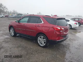 2018 Chevrolet Equinox Premier with VIN 2GNAXVEVXJ6115268, listed as a IAAI auction lot 40881577 with 61,910 mi miles and . Bid and sale history available at DreamBid. Image 3.