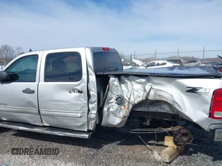 2011 GMC Sierra 1500 SLE with VIN 3GTP2VE3XBG104843, listed as a IAAI auction lot 41823410 with 162,125 mi miles and . Bid and sale history available at DreamBid. Image 6.
