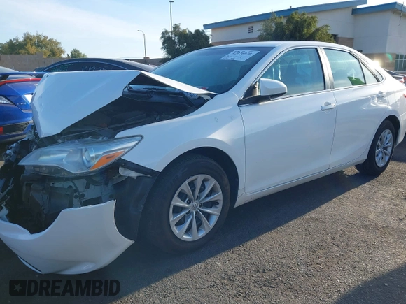 2015 Toyota Camry XLE with VIN 4T1BF1FK9FU923208, listed as a IAAI auction lot 42076970 with 124,096 mi miles and . Bid and sale history available at carsss.com. Image 18.