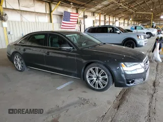 2011 Audi A8 with VIN WAURVAFD4BN004628, listed as a Copart auction lot 52244125 with 182,631 mi miles and Clean title. Bid and sale history available at DreamBid. Image 4.