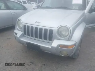 2003 Jeep Liberty Limited with VIN 1J4GL58K73W592677, listed as a IAAI auction lot 41394407 with 1 mi miles. Bid and sale history available at carsss.com. Image 6.