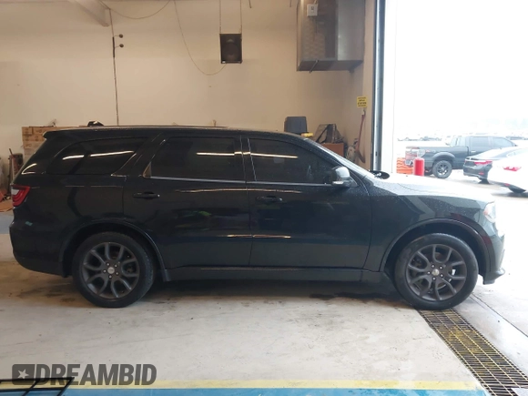 2017 Dodge Durango R/T with VIN 1C4SDJCT8HC897362, listed as a IAAI auction lot 41823155 with 93,367 mi miles and . Bid and sale history available at DreamBid. Image 13.