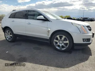 2012 Cadillac SRX Performance Collection with VIN 3GYFNBE33CS540914, listed as a Copart auction lot 54787125 with 130,357 mi miles and Salvage title. Bid and sale history available at DreamBid. Image 4.