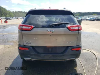 2016 Jeep Cherokee Limited with VIN 1C4PJMDS4GW363942, listed as a Copart auction lot 52027945 with 125,113 mi miles and Salvage Title. Bid and sale history available at DreamBid. Image 6.