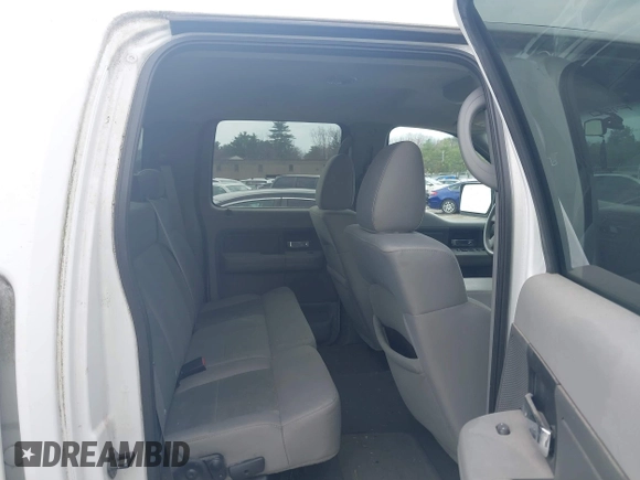 2007 Ford F-150 XLT with VIN 1FTPW14557FB71519, listed as a IAAI auction lot 42136162 with 196,256 mi miles. Bid and sale history available at carsss.com. Image 8.