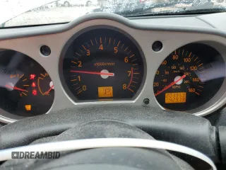 2003 Nissan 350Z Performance z VIN JN1AZ34D33T106988, wystawiony jako Copart lot #57933985 z przebiegiem 203 959 mil mil oraz Szkoda całkowita • Salvage title. Historia ofert i sprzedaży dostępna na DreamBid. Obrazek 9.